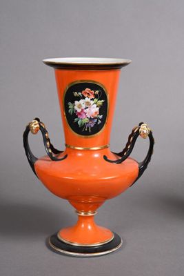 two vases that are sitting on a table