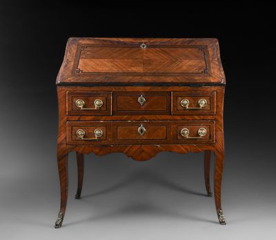 an early 18th century walnut bureau on stand
