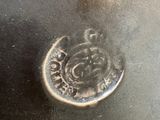 a close up of a metal object on a table