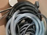 a box with a bunch of hoses inside of it
