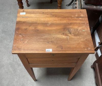 a small wooden table with a drawer on top of it