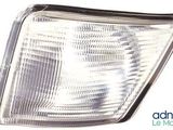a close up of a headlight of a car on a white background