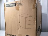 a box that is sitting on a table in front of a wall