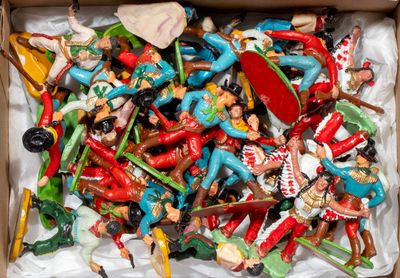 a box full of toy figurines that are in a box