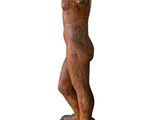 statue of a woman standing on a rock on a white background