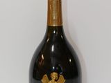 bottle of champagne on a white table with a white background