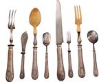 five forks, a spoon, and a knife on a white background