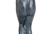 statue of a man standing on a wooden base with a white background