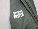 a close up of a jacket with a name tag on it