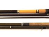 three different types of fishing rods on a white surface