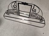 a picture of a picture frame on a stand on the floor