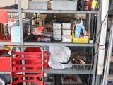 a garage with a lot of items on the shelves