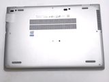 an open laptop computer sitting on top of a white table