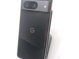 a close up of a cell phone on a stand