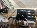 a table with a bunch of jewelry on it