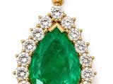 an emerald and diamond pendant