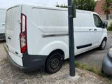 a white van parked on the side of the road