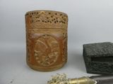 a wooden box and a knife on a table