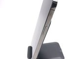 a close up of a cell phone on a stand