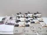 a lot of towels that are sitting on a table