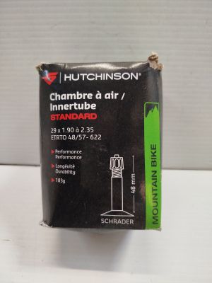 a close up of a box of cigarettes on a white surface
