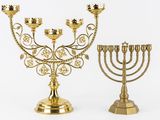 a gold menorah and a gold menorah on a white background