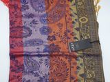 a close up of a scarf with a tag on it