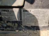 a close up of a vehicle ' s side view mirror with a sticker on it