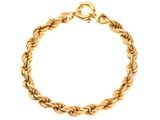 un bracelet en or de type « corde » muni d'un fermoir, sur fond blanc