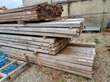 many pieces of wood stacked on top of each other