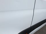 a close up of a white car with black trims