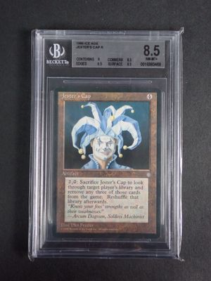 a close up of a card on a table with a black background