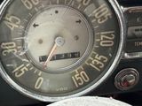 a close up view of a speedometer in a car