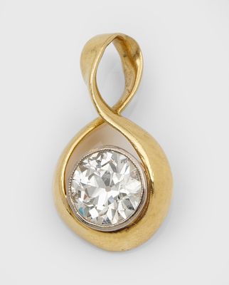 an 18k yellow gold and diamond pendant