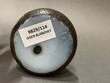 a picture of a close up of a vase with a label on it