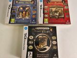 three nintendo wii games sitting on top of a white table