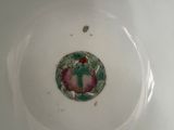 a white bowl with a design on it