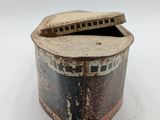 an old wooden box with a lid on a white surface