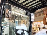 steering wheel of a forklift truck inside of a building
