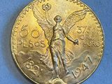 l'image d'une pièce d'or ornée d'un ange