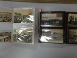 a lot of old photos on the wall of a room