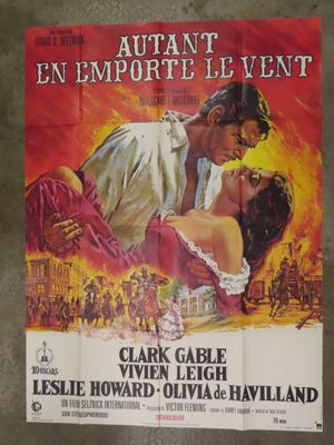 an old movie poster of a man and a woman kissing in front of a crowd