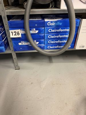 a vacuum that is sitting on a shelf in a store
