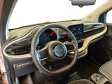 the interior of a car with a steering wheel, dashboard, and dash board