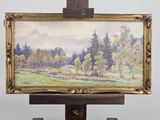 a picture of a painting on a easel with a painting on it