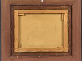 an old picture frame with a picture hanging on the wall