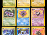 several pokemon cards are shown on a black background