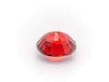 a close up of a red diamond on a white background