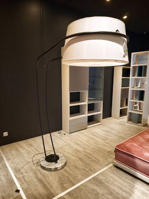 a lamp that is sitting on the floor in a room