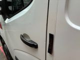 a white van parked on the side of the street